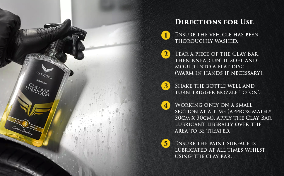 Image shows Car Gods Clay Bar Lubricant trigger bottle spraying onto silver car.