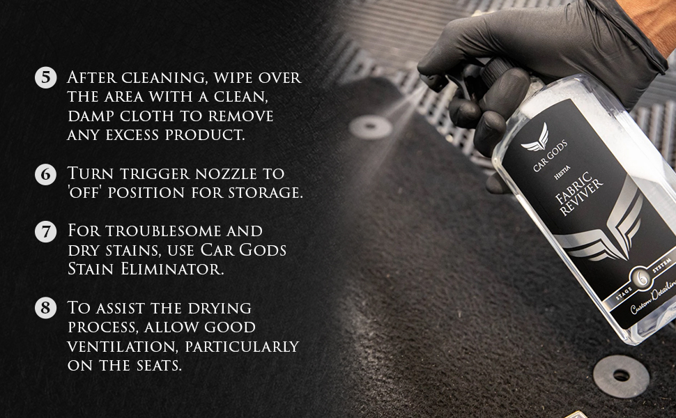 Image shows Car Gods Fabric Reviver being sprayed onto a dirty car mat.