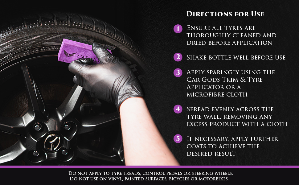 Image shows Black Angel Tyre Serum being applied to a clean car tyre with a Car Gods Trim & Tyre Applicator. Text: Do not apply to tyre treads, control pedals or steering wheels. Do not use on vinyl, painted surfaces, bicycles, or motorbikes.